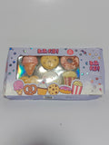 Set of 6 fun snack-shaped bath fizzers for a relaxing and colorful bath experience.