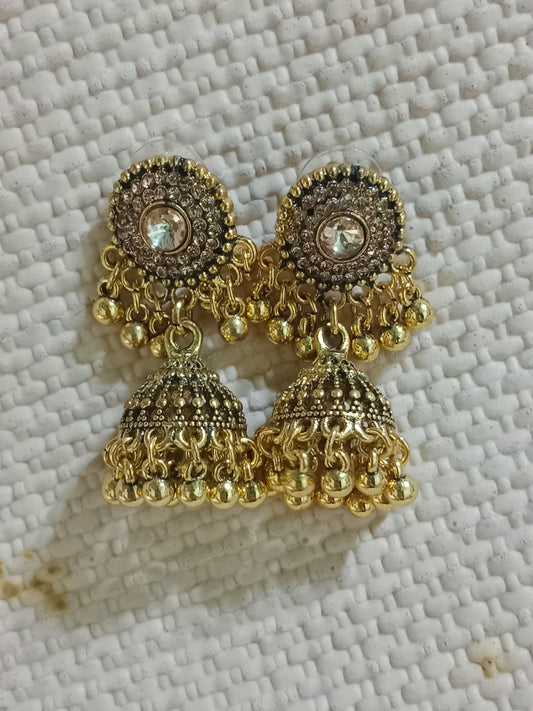 Golden Traditional Jhumka Earrings with Stone Studded Design